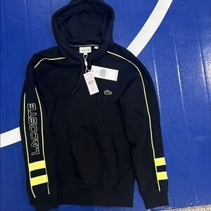 Lacoste Black Hoodie with Yellow Accents